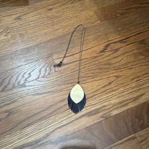 Noonday Collection reversible long pendant necklace.